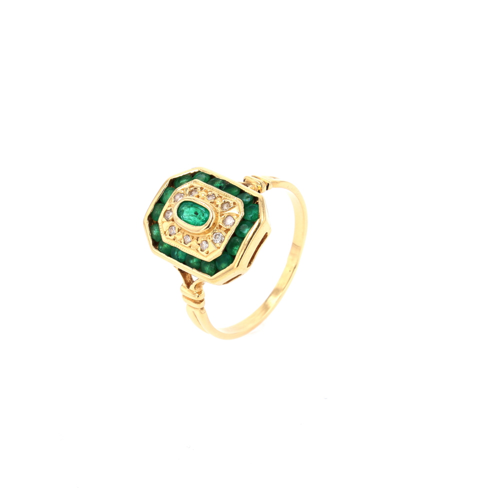 Bague Art Déco en or jaune, émeraudes et diamants