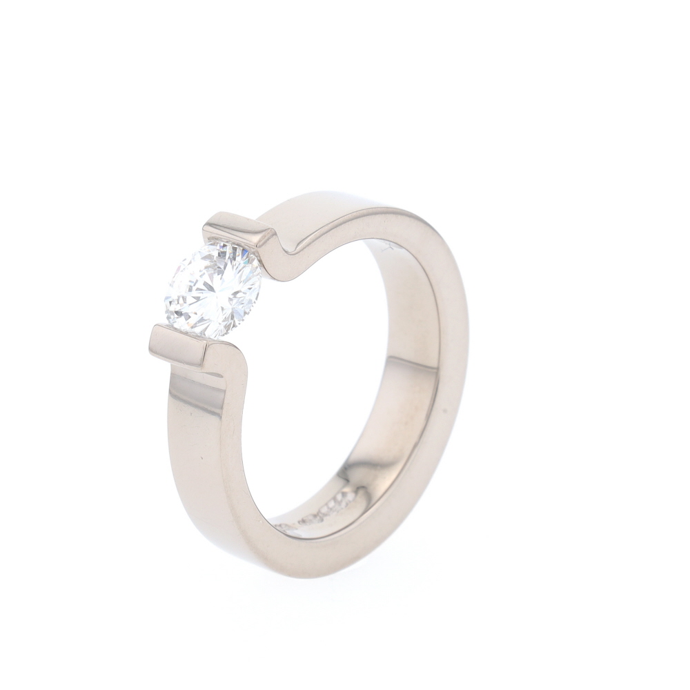 Bague Solitaire Tension Niessing en or blanc et diamant