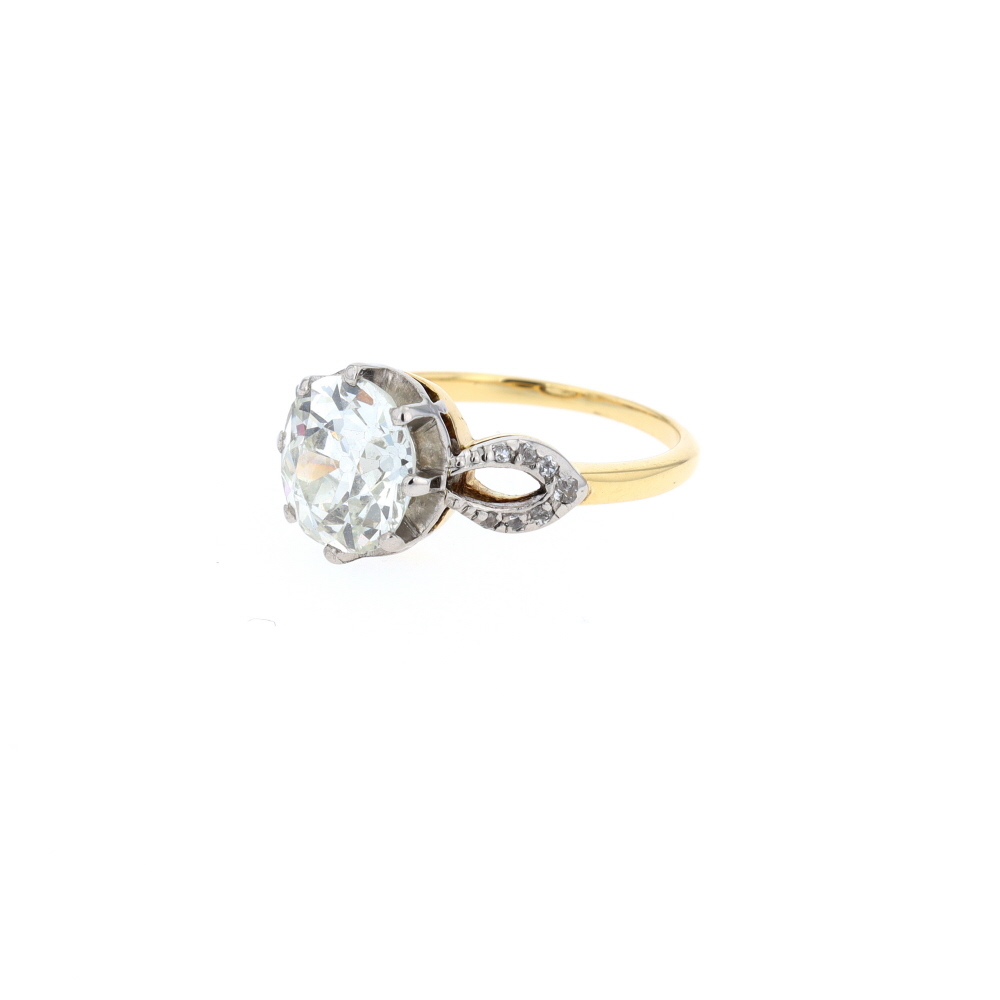 Bague Solitaire en or jaune, platine et diamants
